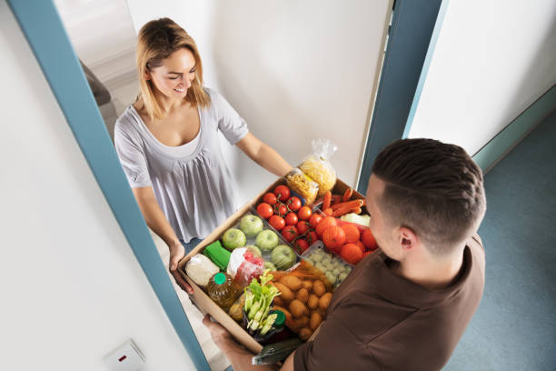 istock Man Delivering Groceries 917033902