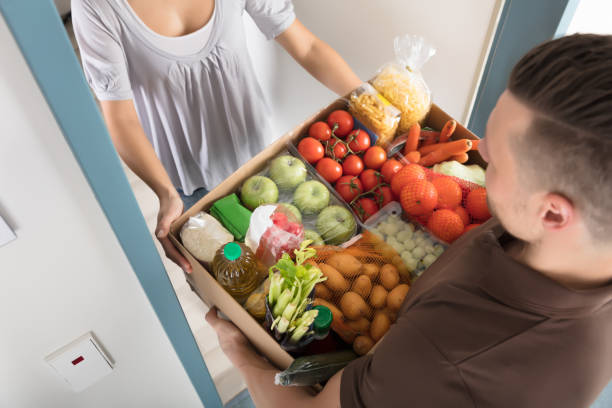 istock Man Delivering Groceries 917033904