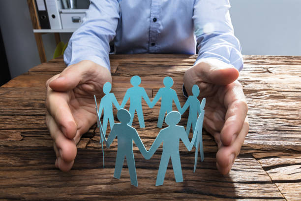 istock Person Protecting Paper Cut Out Figure 917034504