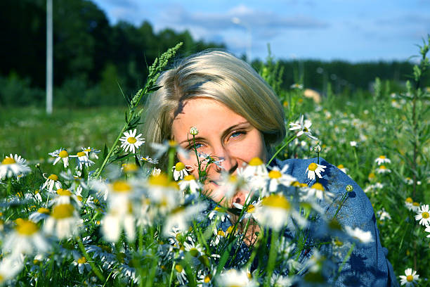 istock Young Woman With daisy 91703540