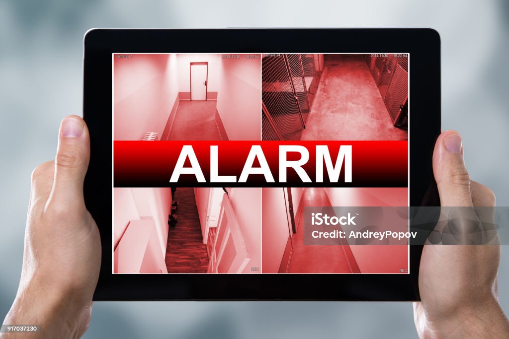 Digital Tablet Displaying Alarm Text Adult Stock Photo