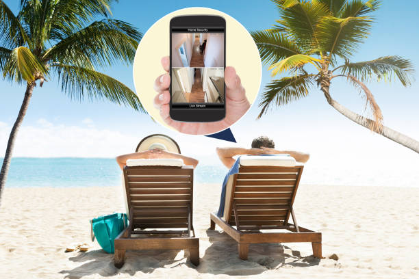 istock Home Security Cameras Viewed On Mobile Phone 917037326