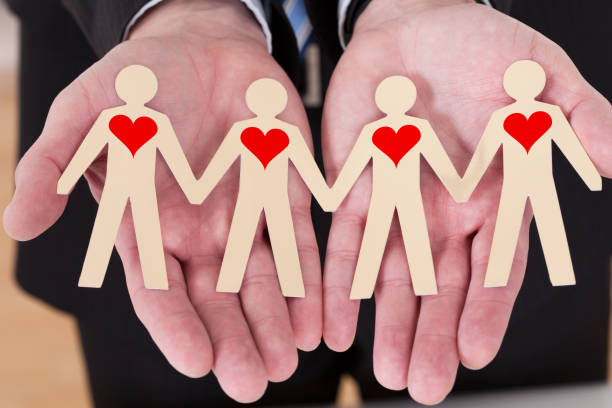 istock Hand Showing Paper Cut Out Figures 917037346