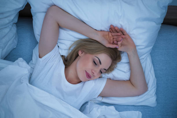 istock Blonde Woman Sleeping On Bed 917037400