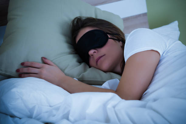 istock Woman Sleeping With Eye Mask 917037404
