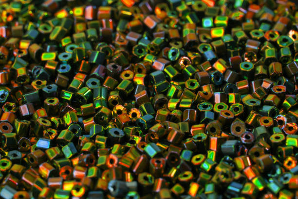 бисер, жучок, разноцветные в качестве фоновой текстуры - glass jewelry bead bugle стоковые фото и изображения