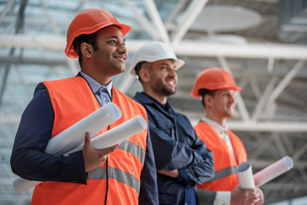 istock Positive skilled engineers are enjoying their project 917046094