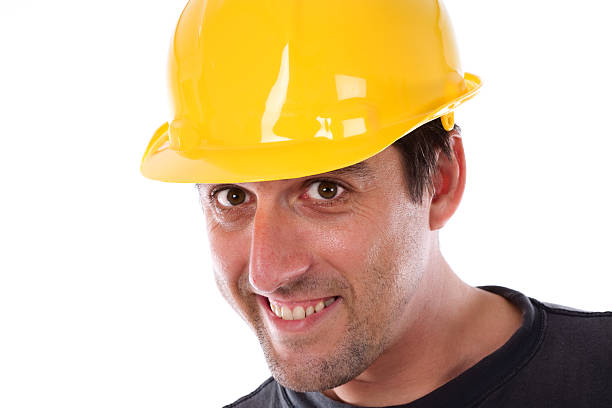 istock Cute young worker with yellow helmet 91704753