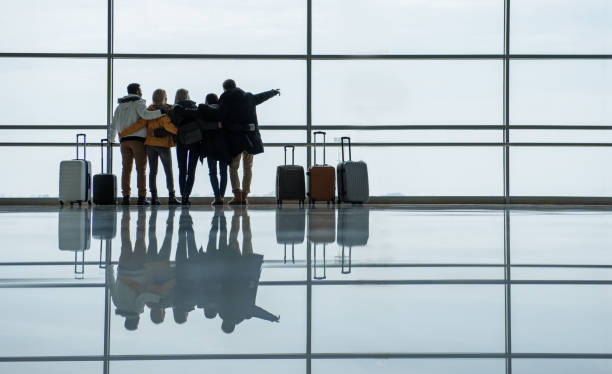 istock Group of people are enjoying view while having friendly embrace 917048772
