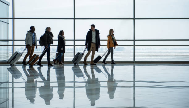 istock Pleasant passengers are going to departure area 917048852