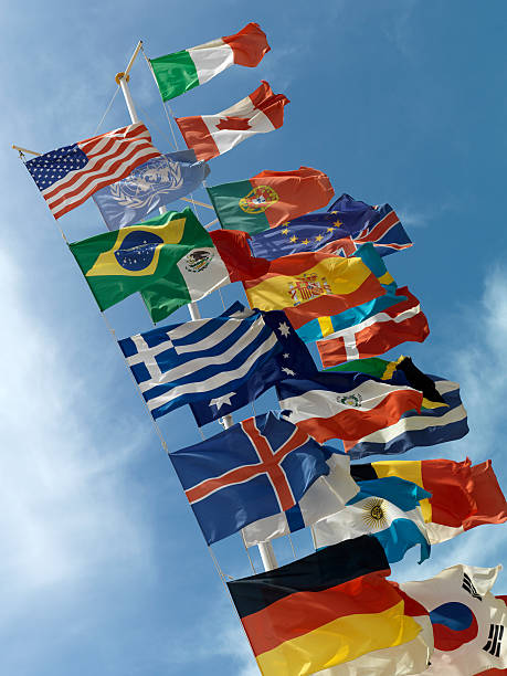 International flags on a pole waving outside