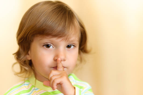 istock Little girl calls for silence 91705377