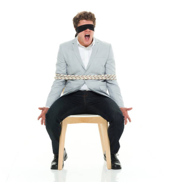 istock Smart casual dressed man seated 917056660