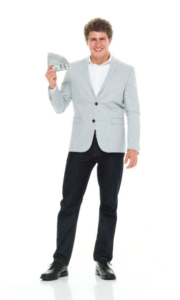 istock Businessman in smart casual clothes holding US currency 917059232