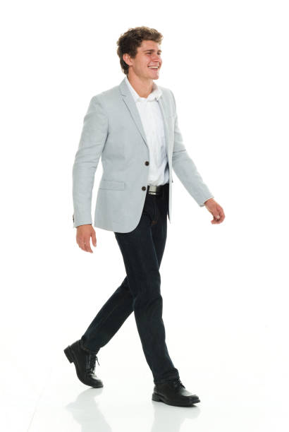 istock Businessman in smart casual clothes walking 917059400