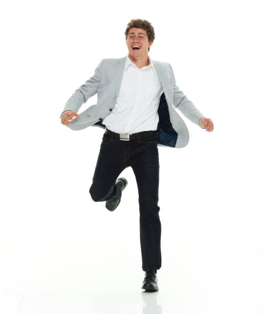 istock Businessman in smart casual clothes running 917059420