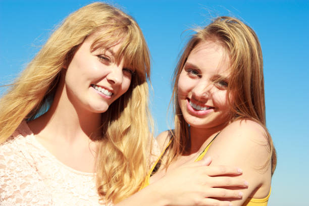 istock Two women best friends having fun outdoor 917059980