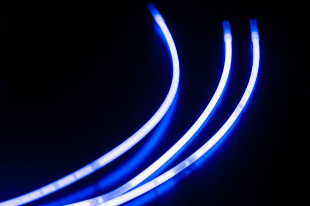 istock glow sticks of blue on a black surface 917063804