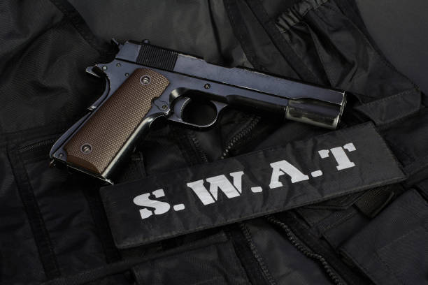 istock Special weapons and tactics team equipment on black background 917063980