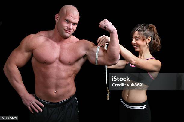 Bodybuilding カップル巻き尺 - マッチョのストックフォトや画像を多数ご用意 - マッチョ, アクティブライフスタイル, インストラクター