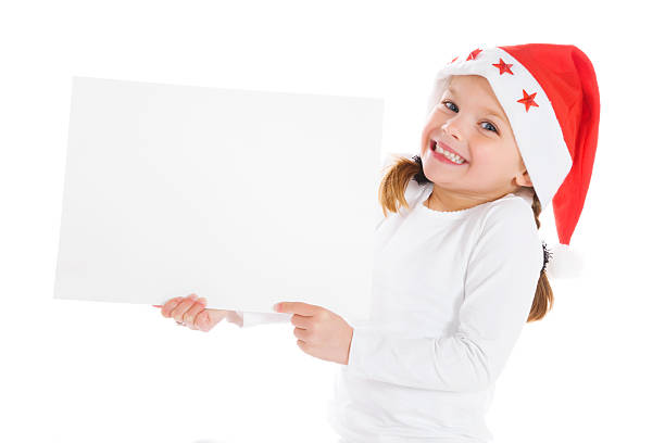 Garota de Natal bonito com sinal em branco - foto de acervo