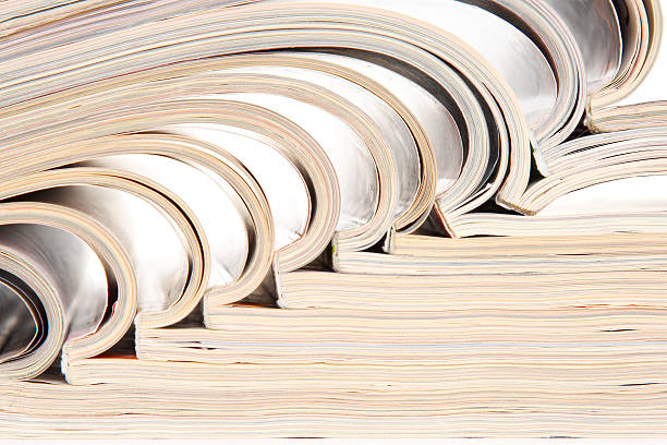 istock heap of open magazines 91708251