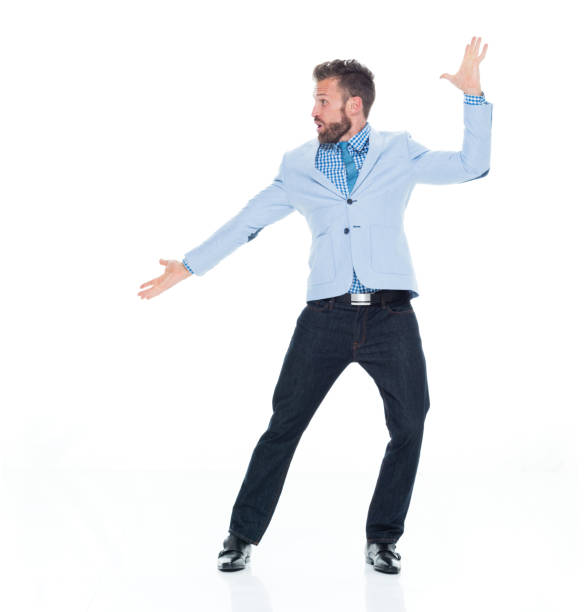 istock Attractive businessman presenting and pointing 917085036