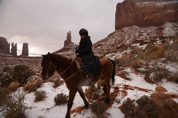 istock Horse riding in Utah on a snowy winter day 917085270