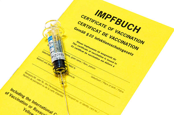 Certificate of vaccination with Influenza injection isolated on white stock photo