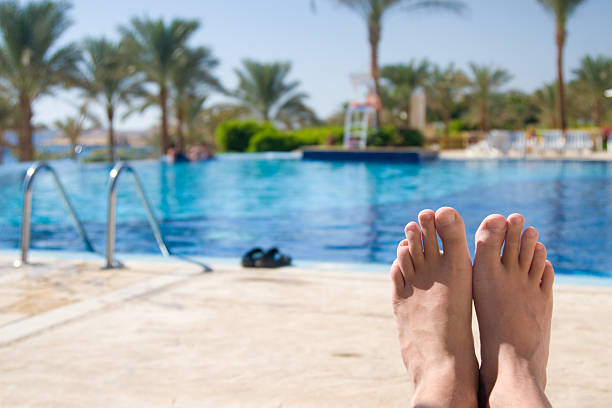 istock Enjoyment near the pool. 91709192