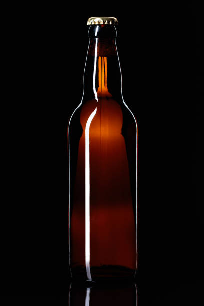 istock Closed bottle of beer on a black background. 917093712