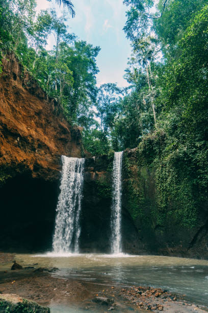 istock Tibumana waterfall in Bali, Indonesia 917093834
