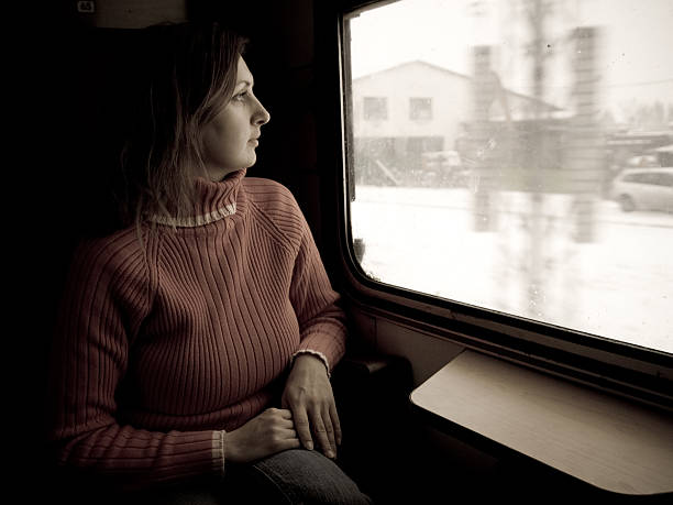 istock Pensive woman in train 91709730