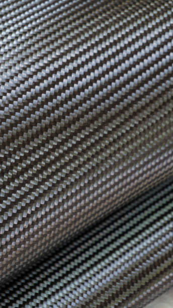 istock Black carbon fiber composite material background 917101694