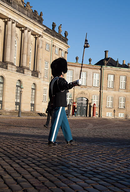 istock Royal life guard marching into Amalienborg Palace 91710416