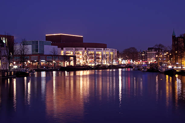 Amsterdam city by night in the Netherlands  stopera stock pictures, royalty-free photos & images