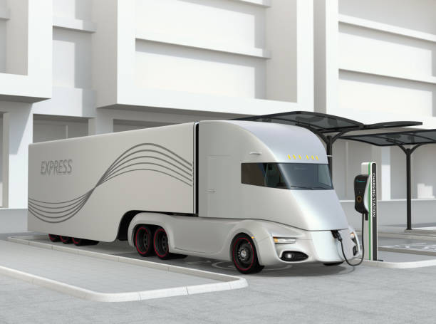istock Silver self-driving electric truck charging at charging station 917113470