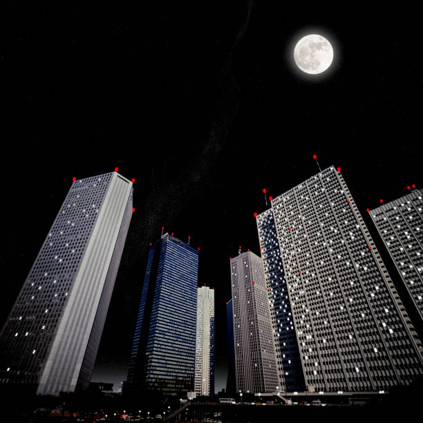 istock Full moon rising over the skyscraper 917116934