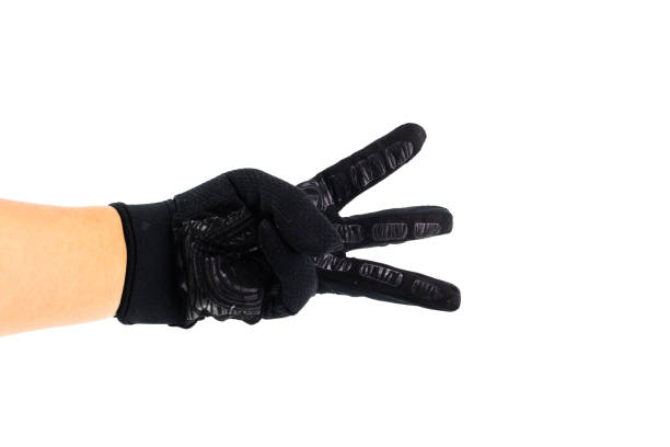 istock Man hand is showing finger symbol with black glove 917119922
