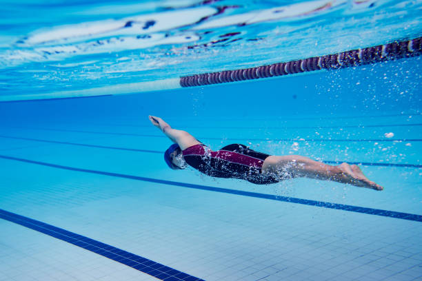 istock Woman swimming pool.Underwater photo 917122986