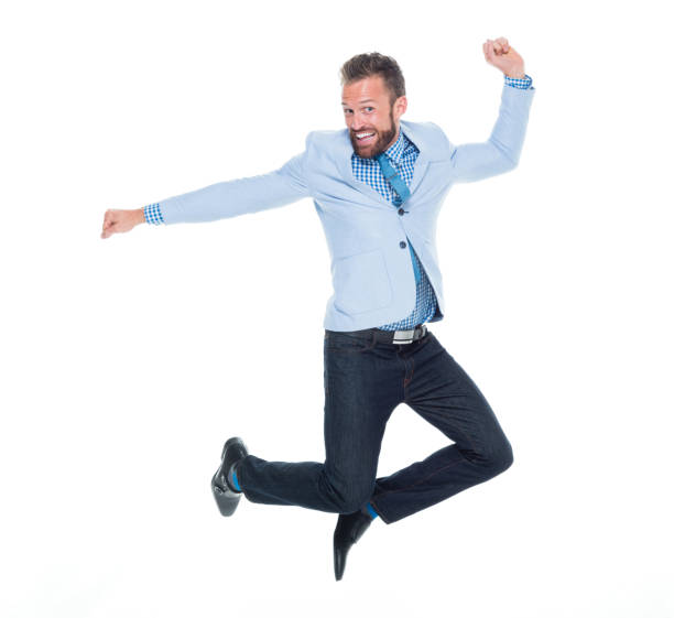 istock Handsome businessman jumping with excitement 917125606
