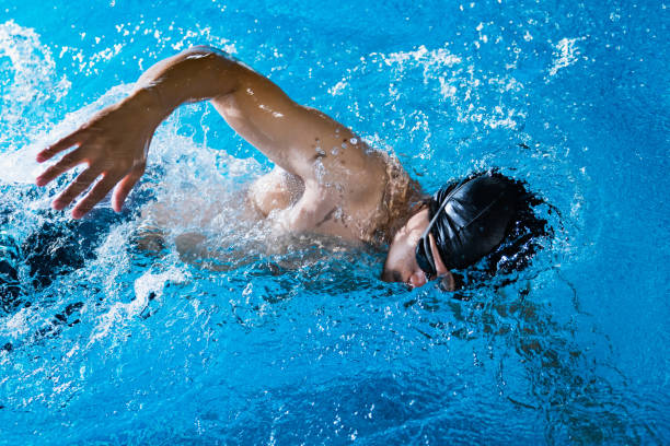 istock Swimmers are swimming 
