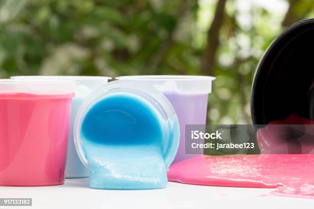 Bottles Of Homemade Plaything Called Slime Colorful Of Science Toy In  Container Spill On Table Selective Focus On Slime Stock Photo - Download  Image Now - iStock