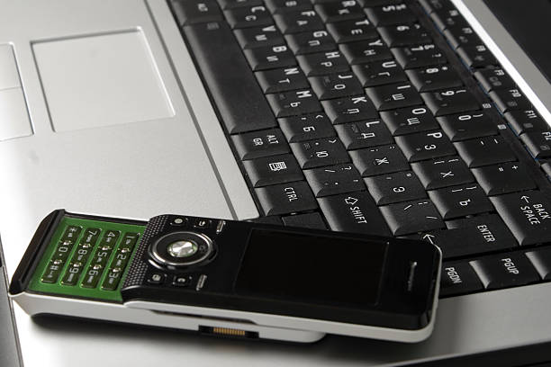 istock Black keyboard and mobile phone 91713955