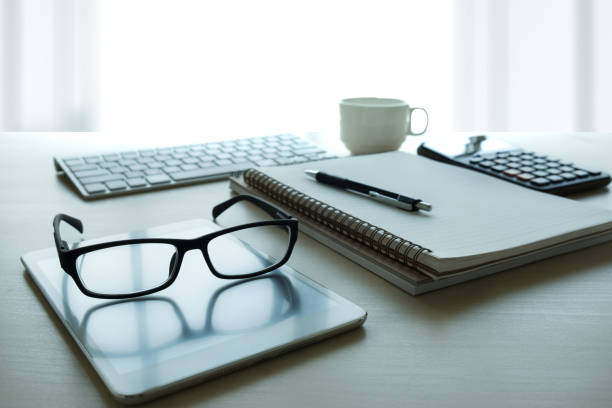 istock Close up of glasses and computer  business workplace work place in office 917139830