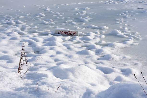 istock Danger Sign Warns of Thin Ice on Pond, Vancouver, Canada 91714898