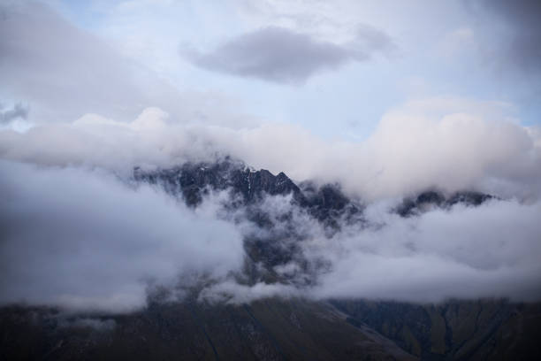 istock Mountain panoramic view on a evening. Beautiful evening mountain landscape under bright sunset. Georgia Kazbegi 917149920