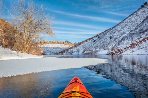 istock winter kayak paddling in Colorado 917154000