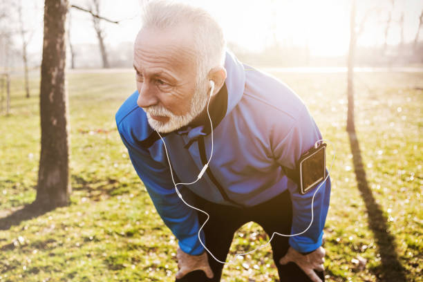 istock Close up of a senior man jogging 917159148