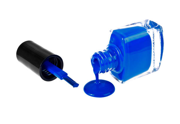 istock Blue nail polish and brush on a white background 917163216